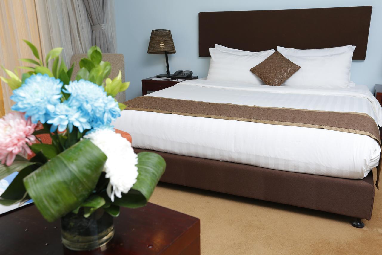 Tolip Family Park Hotel Káhira Exteriér fotografie A bedroom at the hotel